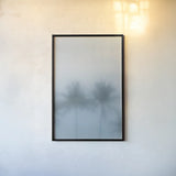 Palms in the Mist I by Deborah Revell. shown as a paper print in a black flame. Available as a archival giclee rolled canvas, fine art paper, or poster print. SKU 104906h.