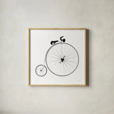 Penny Farthing by Deborah Revell. Shown in a natural wood glass frame for a timeless modern aesthetic. Available as an archival giclee rolled canvas, fine art paper, or poster print. SKU 92265a.