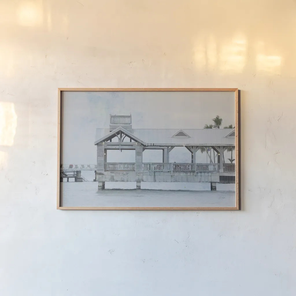 Pier III by Deborah Revell. shown as a paper print in a natural frame. Available as a archival giclee rolled canvas, fine art paper, or poster print. SKU 91626i.