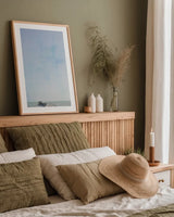 Pier V by Deborah Revell. shown as a paper print in a natural frame. Available as a archival giclee rolled canvas, fine art paper, or poster print. SKU 91628h.