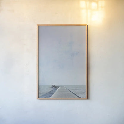 Pier V by Deborah Revell. shown as a paper print in a natural frame. Available as a archival giclee rolled canvas, fine art paper, or poster print. SKU 91628h.