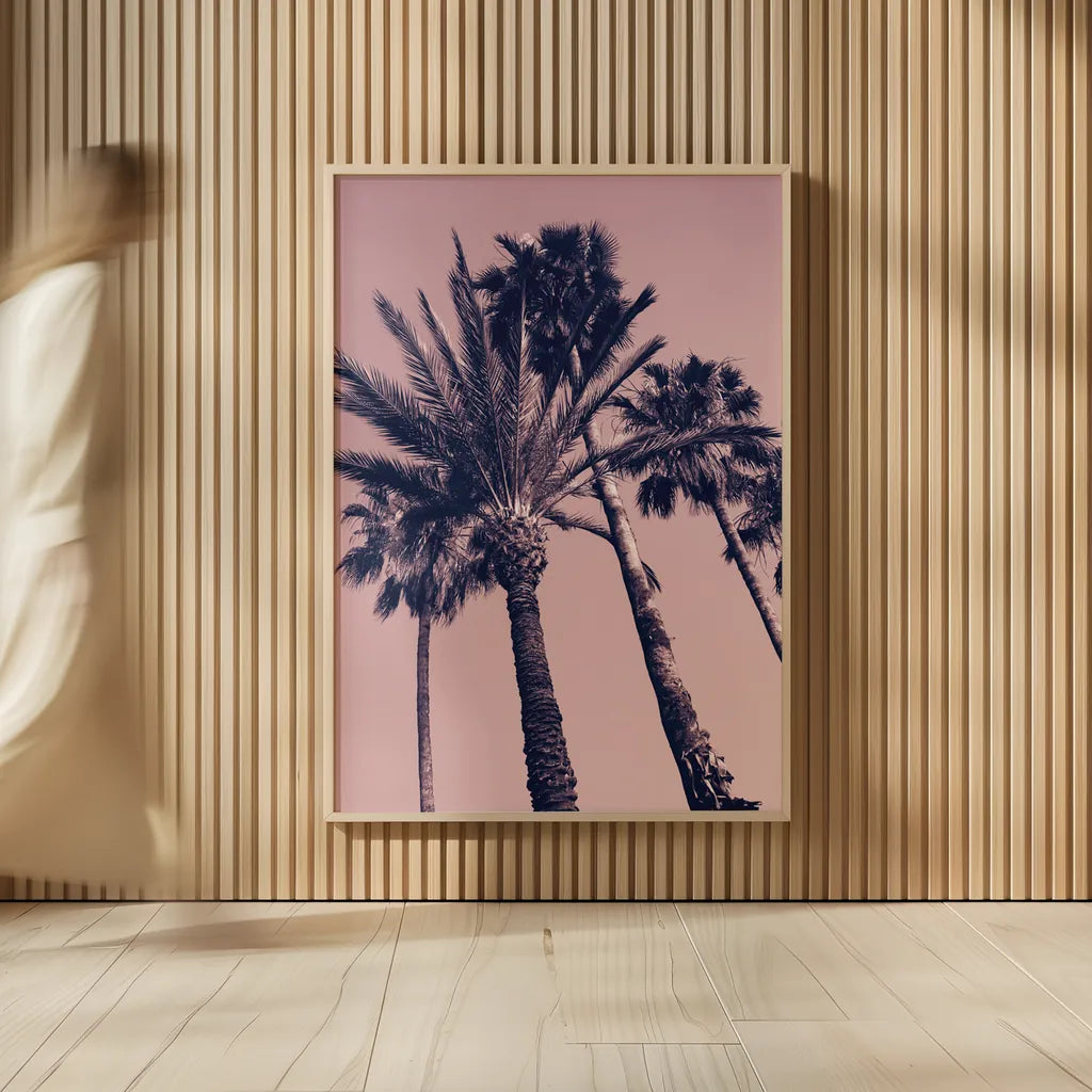 Pink Palms II by Deborah Revell. shown as over sized large wall art. Available as an archival giclee rolled canvas, fine art paper, or poster print. SKU 94376h.