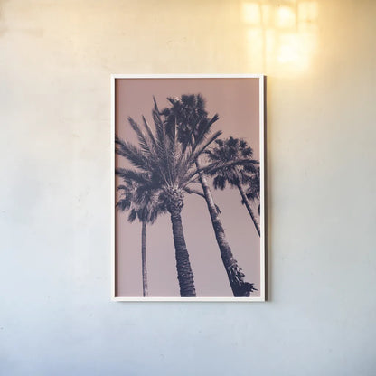 Pink Palms II by Deborah Revell. shown as a paper print in a white frame. Available as a archival giclee rolled canvas, fine art paper, or poster print. SKU 94376h.