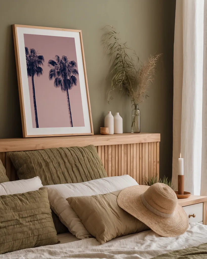 Pink Palms III by Deborah Revell. shown as a paper print in a natural frame. Available as a archival giclee rolled canvas, fine art paper, or poster print. SKU 101783h.