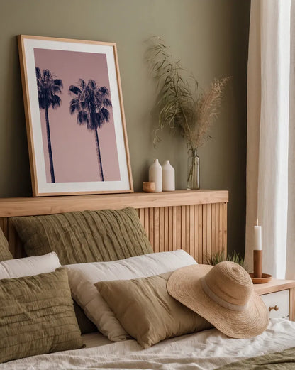 Pink Palms III by Deborah Revell. shown as a paper print in a natural frame. Available as a archival giclee rolled canvas, fine art paper, or poster print. SKU 101783h.