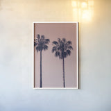 Pink Palms III by Deborah Revell. shown as a paper print in a white frame. Available as a archival giclee rolled canvas, fine art paper, or poster print. SKU 101783h.