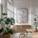 Pink Silene by Deborah Revell. shown as a print in a natural wood frame in a dining room. Available as a archival giclee rolled canvas, fine art paper, or poster print. SKU 93421h.
