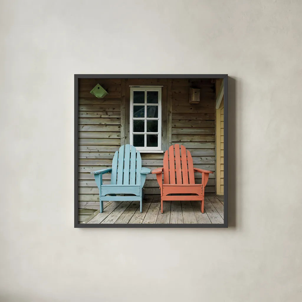 Porch Chairs by Deborah Revell. Shown in a sleek black glass frame for a contemporary gallery look. Available as an archival giclee rolled canvas, fine art paper, or poster print. SKU 94578a.
