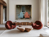 Porch Chairs by Deborah Revell. Shown as extra-large giant wall art in a modern living room. Available as an archival giclee rolled canvas, fine art paper, or poster print. SKU 94578a.