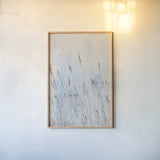 Reeds on the Ley I by Deborah Revell. shown as a paper print in a natural frame. Available as a archival giclee rolled canvas, fine art paper, or poster print. SKU 91119h.