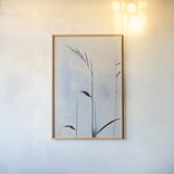 Reeds on the Ley II by Deborah Revell. shown as a paper print in a natural frame. Available as a archival giclee rolled canvas, fine art paper, or poster print. SKU 91120h.
