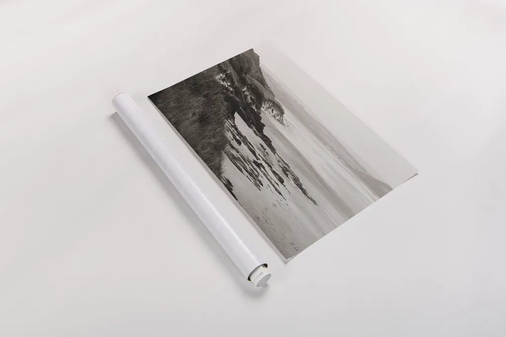 Rock Beach by Deborah Revell. shown as a rolled paper print. Available as archival giclee rolled canvas, fine art paper, or poster print. SKU 101000i.