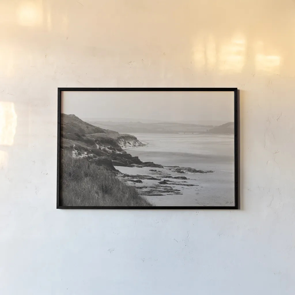 Rock Beach by Deborah Revell. shown as a paper print in a black flame. Available as a archival giclee rolled canvas, fine art paper, or poster print. SKU 101000i.