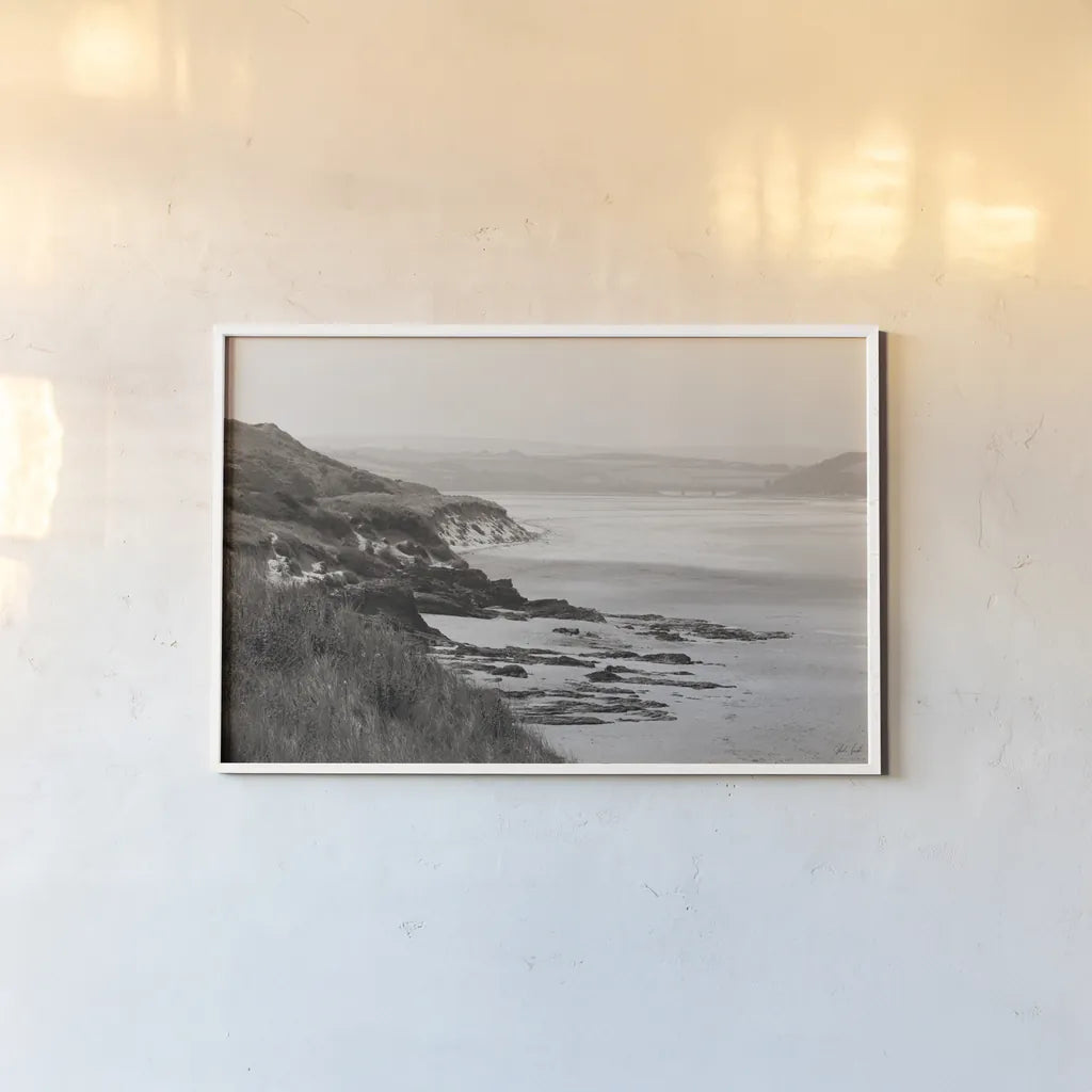 Rock Beach by Deborah Revell. shown as a paper print in a white frame. Available as a archival giclee rolled canvas, fine art paper, or poster print. SKU 101000i.
