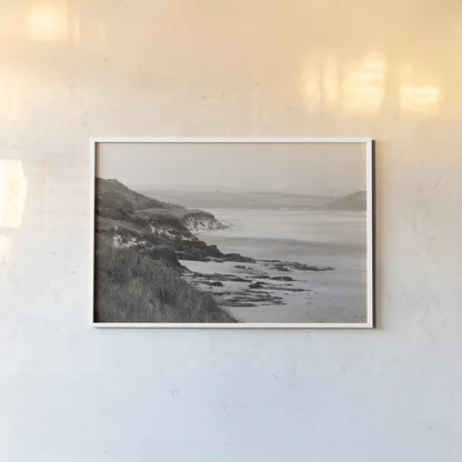 Rock Beach by Deborah Revell. shown as a paper print in a white frame. Available as a archival giclee rolled canvas, fine art paper, or poster print. SKU 101000i.