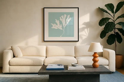 Seaweed I by Deborah Revell. Displayed in a glass frame with matte in a clean modern living room. Available as an archival giclee rolled canvas, fine art paper, or poster print. SKU 91124a.