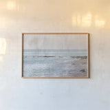 Secret Beach by Deborah Revell. shown as a paper print in a natural frame. Available as a archival giclee rolled canvas, fine art paper, or poster print. SKU 94274i.