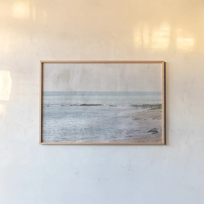 Secret Beach by Deborah Revell. shown as a paper print in a natural frame. Available as a archival giclee rolled canvas, fine art paper, or poster print. SKU 94274i.