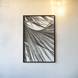 Sepia Palm by Deborah Revell. shown as a paper print in a black flame. Available as a archival giclee rolled canvas, fine art paper, or poster print. SKU 95327h.