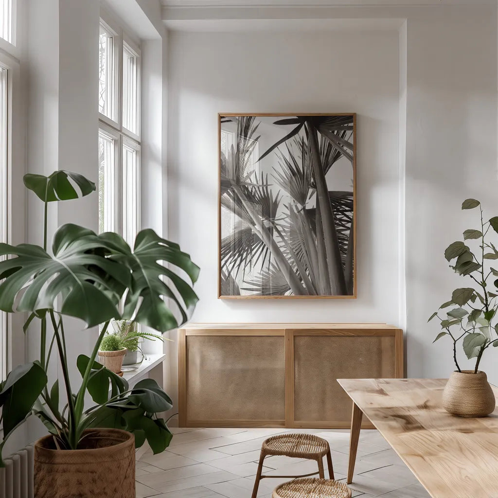 Sepia Palms by Deborah Revell. shown as a print in a natural wood frame in a dining room. Available as a archival giclee rolled canvas, fine art paper, or poster print. SKU 94294h.