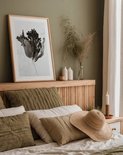 Sepia Tulip I by Deborah Revell. shown as a paper print in a natural frame. Available as a archival giclee rolled canvas, fine art paper, or poster print. SKU 93418h.