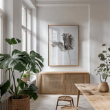 Sepia Tulip III by Deborah Revell. shown as a print in a natural wood frame in a dining room. Available as a archival giclee rolled canvas, fine art paper, or poster print. SKU 93420h.