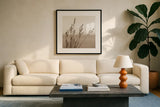 Sepia Wheat by Deborah Revell. Displayed in a glass frame with matte in a clean modern living room. Available as an archival giclee rolled canvas, fine art paper, or poster print. SKU 104325a.