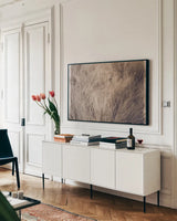 Soft Grasses I by Deborah Revell. shown as a framed stretched canvas in a living room above a console. Available as a archival giclee rolled canvas, fine art paper, or poster print. SKU 94357i.