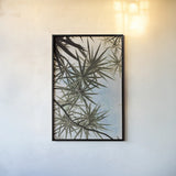 Spiral Palm II by Deborah Revell. shown as a paper print in a black flame. Available as a archival giclee rolled canvas, fine art paper, or poster print. SKU 104281h.