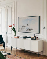 Spring Leaves by Deborah Revell. shown as a framed stretched canvas in a living room above a console. Available as a archival giclee rolled canvas, fine art paper, or poster print. SKU 91876i.