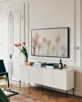 Still Wild II by Deborah Revell. shown as a framed stretched canvas in a living room above a console. Available as a archival giclee rolled canvas, fine art paper, or poster print. SKU 100054i.
