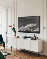The Dolomites I by Deborah Revell. shown as a framed stretched canvas in a living room above a console. Available as a archival giclee rolled canvas, fine art paper, or poster print. SKU 92048i.