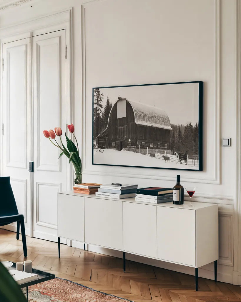 The Farm by Deborah Revell. shown as a framed stretched canvas in a living room above a console. Available as a archival giclee rolled canvas, fine art paper, or poster print. SKU 96615i.