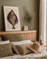 The Flounder by Deborah Revell. shown as a paper print in a natural frame. Available as a archival giclee rolled canvas, fine art paper, or poster print. SKU 95765h.