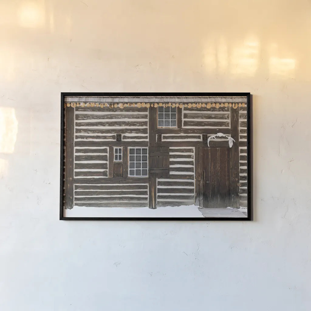 The Hunting Cabin by Deborah Revell. shown as a paper print in a black flame. Available as a archival giclee rolled canvas, fine art paper, or poster print. SKU 96611i.