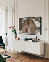The Hunting Lodge II by Deborah Revell. shown as a framed stretched canvas in a living room above a console. Available as a archival giclee rolled canvas, fine art paper, or poster print. SKU 96610i.