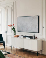 The Meadow by Deborah Revell. shown as a framed stretched canvas in a living room above a console. Available as a archival giclee rolled canvas, fine art paper, or poster print. SKU 93441i.