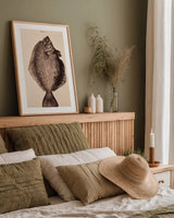 The Plaice by Deborah Revell. shown as a paper print in a natural frame. Available as a archival giclee rolled canvas, fine art paper, or poster print. SKU 95766h.