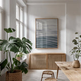 The Silent Sea I by Deborah Revell. shown as a print in a natural wood frame in a dining room. Available as a archival giclee rolled canvas, fine art paper, or poster print. SKU 100987h.