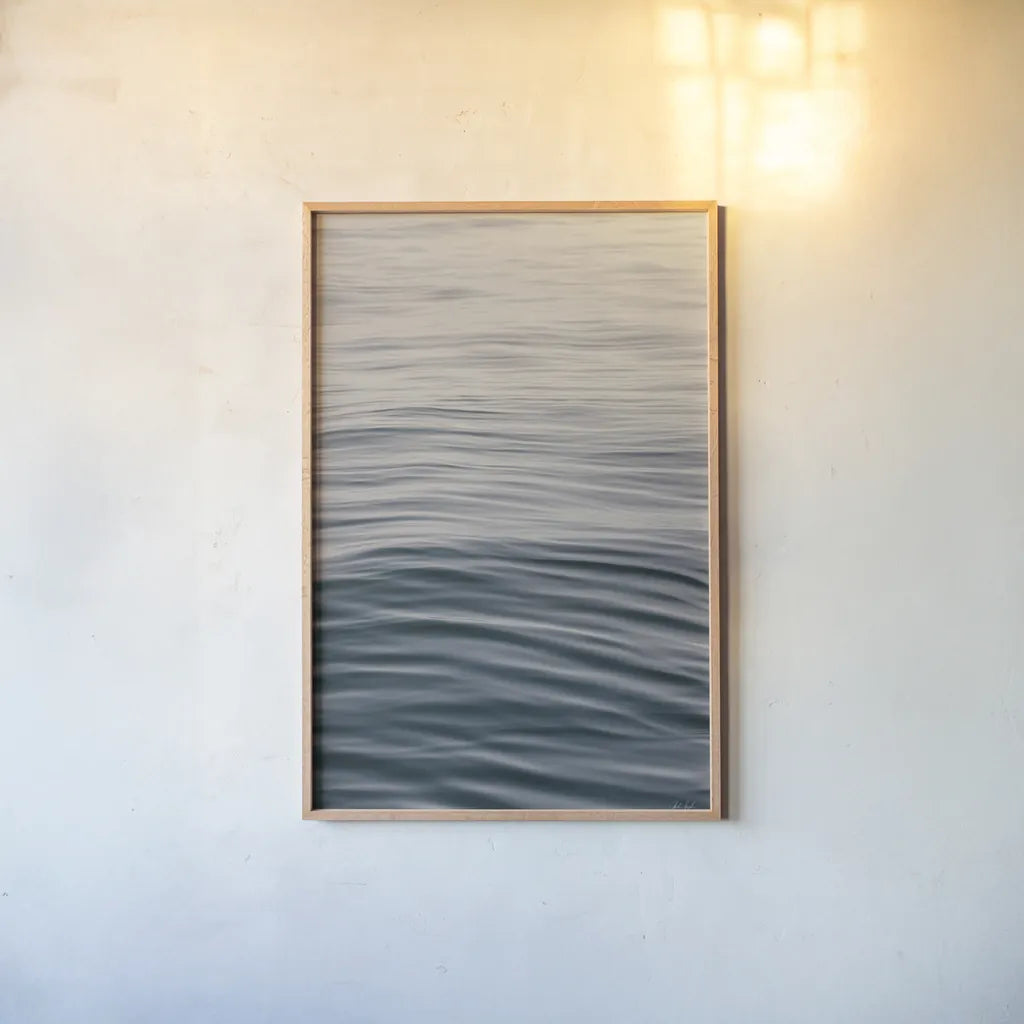 The Silent Sea I by Deborah Revell. shown as a paper print in a natural frame. Available as a archival giclee rolled canvas, fine art paper, or poster print. SKU 100987h.