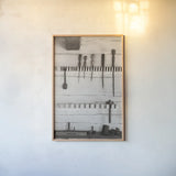 The Workshop I by Deborah Revell. shown as a paper print in a natural frame. Available as a archival giclee rolled canvas, fine art paper, or poster print. SKU 96612h.