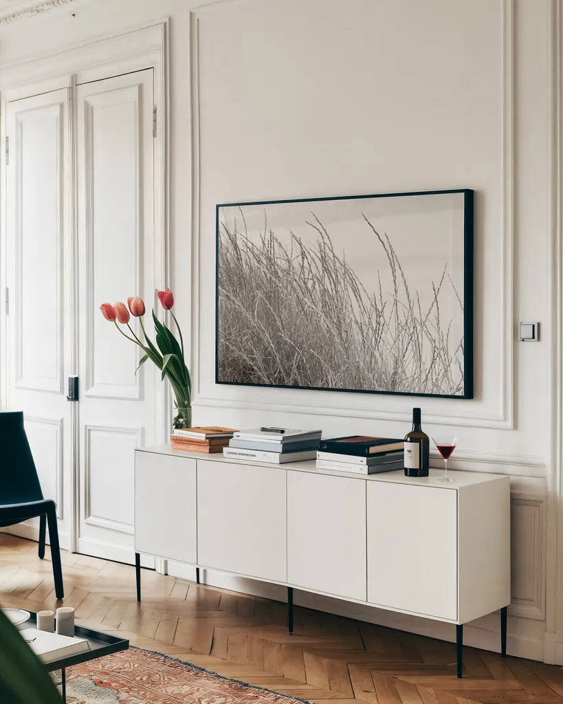 Tidegrass I by Deborah Revell. shown as a framed stretched canvas in a living room above a console. Available as a archival giclee rolled canvas, fine art paper, or poster print. SKU 102086i.