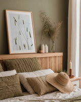 Timothy Grass by Deborah Revell. shown as a paper print in a natural frame. Available as a archival giclee rolled canvas, fine art paper, or poster print. SKU 93433h.