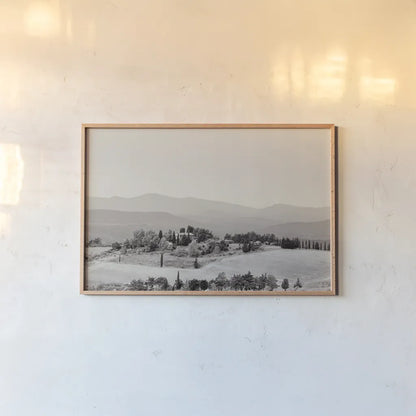 Tuscan Hills II by Deborah Revell. shown as a paper print in a natural frame. Available as a archival giclee rolled canvas, fine art paper, or poster print. SKU 102089i.