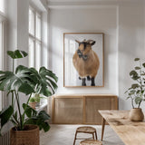 Two Little Goats II by Deborah Revell. shown as a print in a natural wood frame in a dining room. Available as a archival giclee rolled canvas, fine art paper, or poster print. SKU 96309h.