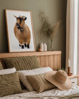 Two Little Goats II by Deborah Revell. shown as a paper print in a natural frame. Available as a archival giclee rolled canvas, fine art paper, or poster print. SKU 96309h.