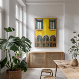 Venice Window by Deborah Revell. shown as a print in a natural wood frame in a dining room. Available as a archival giclee rolled canvas, fine art paper, or poster print. SKU 95014h.