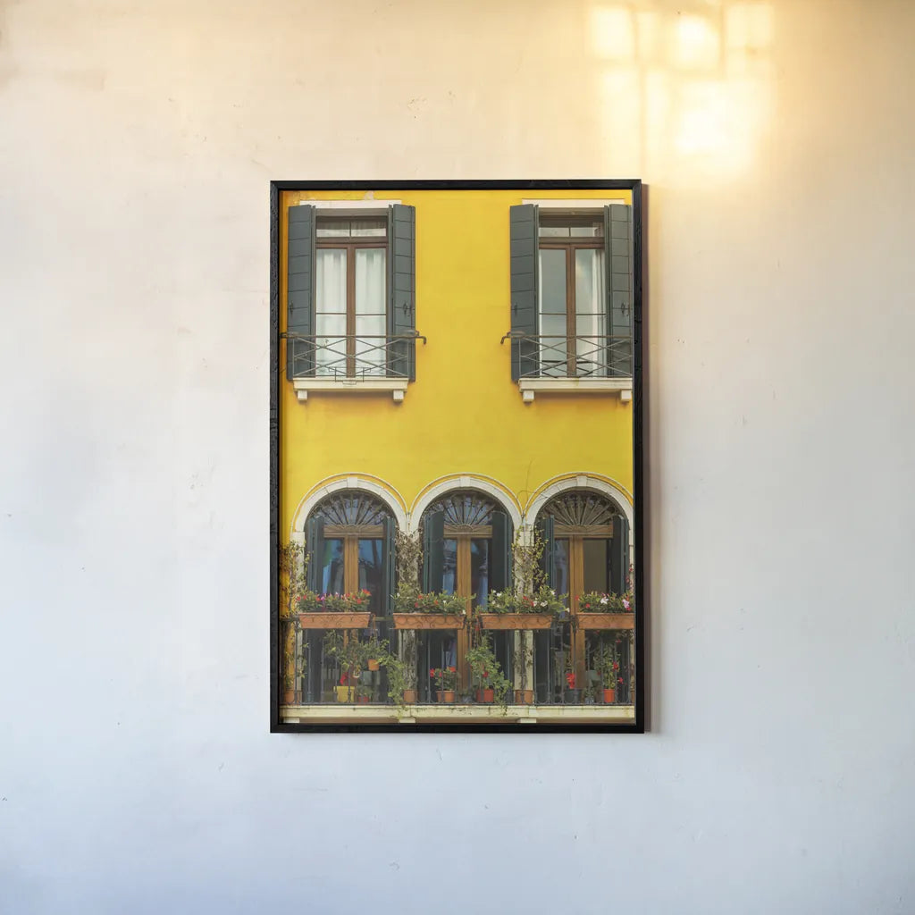 Venice Window by Deborah Revell. shown as a paper print in a black flame. Available as a archival giclee rolled canvas, fine art paper, or poster print. SKU 95014h.
