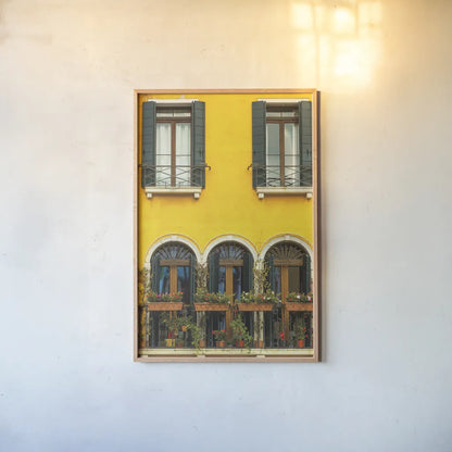 Venice Window by Deborah Revell. shown as a paper print in a natural frame. Available as a archival giclee rolled canvas, fine art paper, or poster print. SKU 95014h.