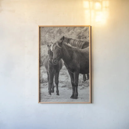 Vertical Ponies by Deborah Revell. shown as a paper print in a natural frame. Available as a archival giclee rolled canvas, fine art paper, or poster print. SKU 94288h.